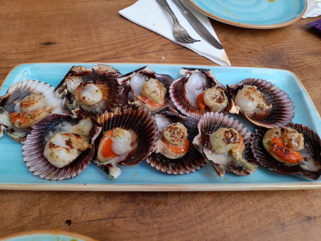 El Meson Do Pulpo — Comida y bebida