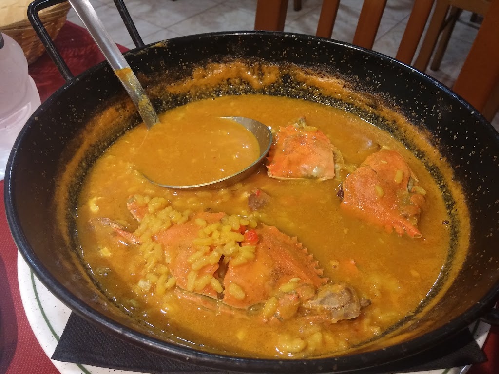 Restaurante Turia. — Comida y bebida
