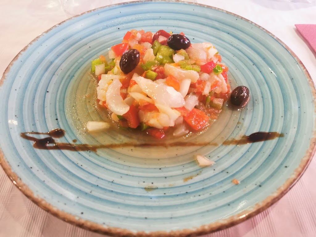 Restaurante Can Belles — Comida y bebida