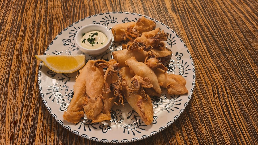 Restaurante Pizzeria Manolo — Comida y bebida