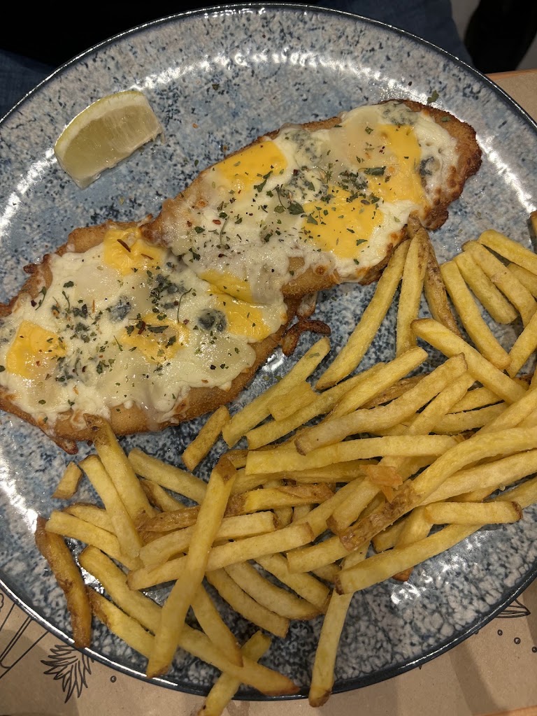 Villa Albertina Parrilla argentina Milanesas — Comida y bebida