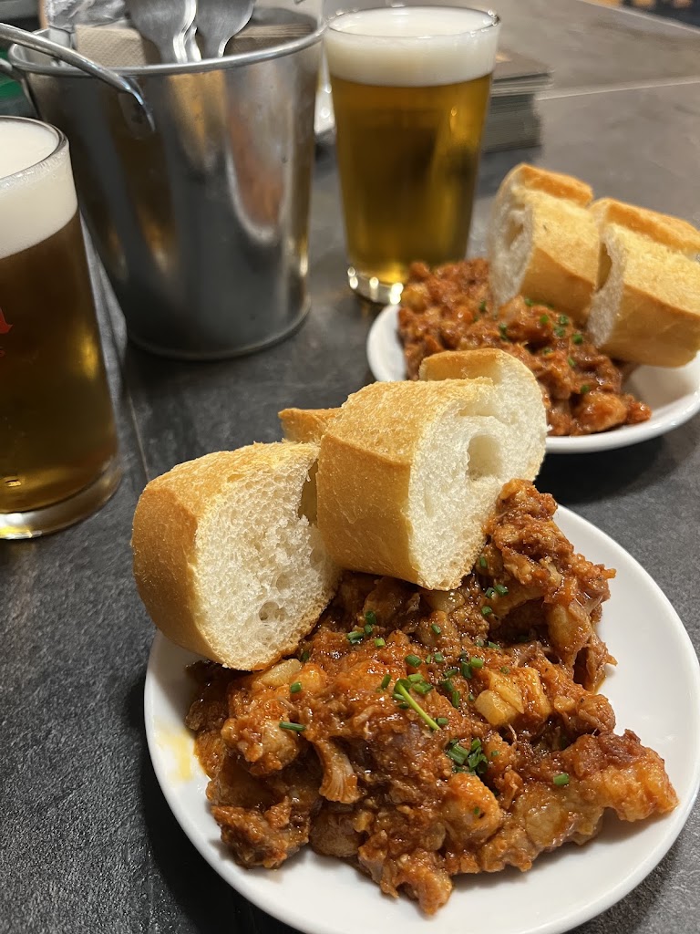Origenes Taberna — Comida y bebida