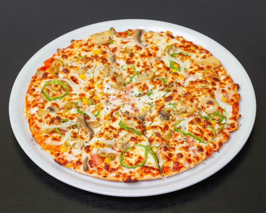 ZAIQA KEBAB PIZZAS — Comida y bebida
