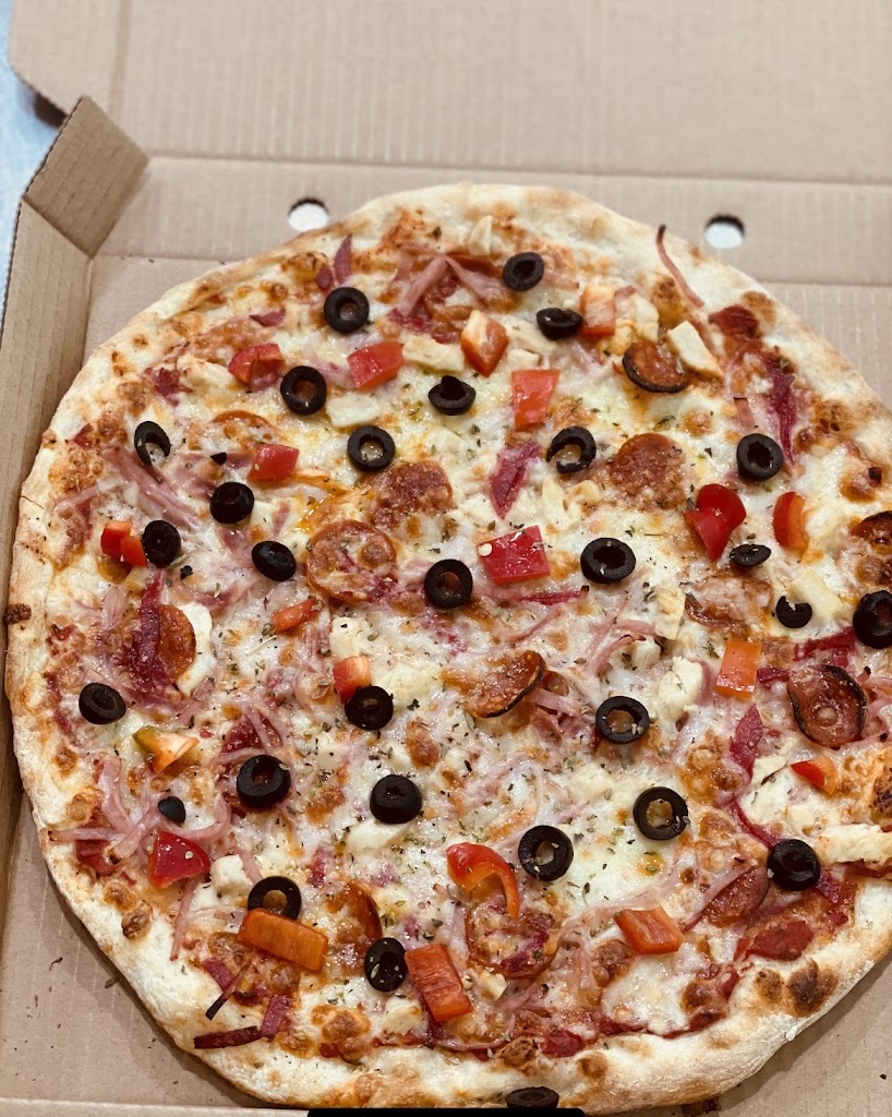 + K Pizza Molins de REi — Comida y bebida
