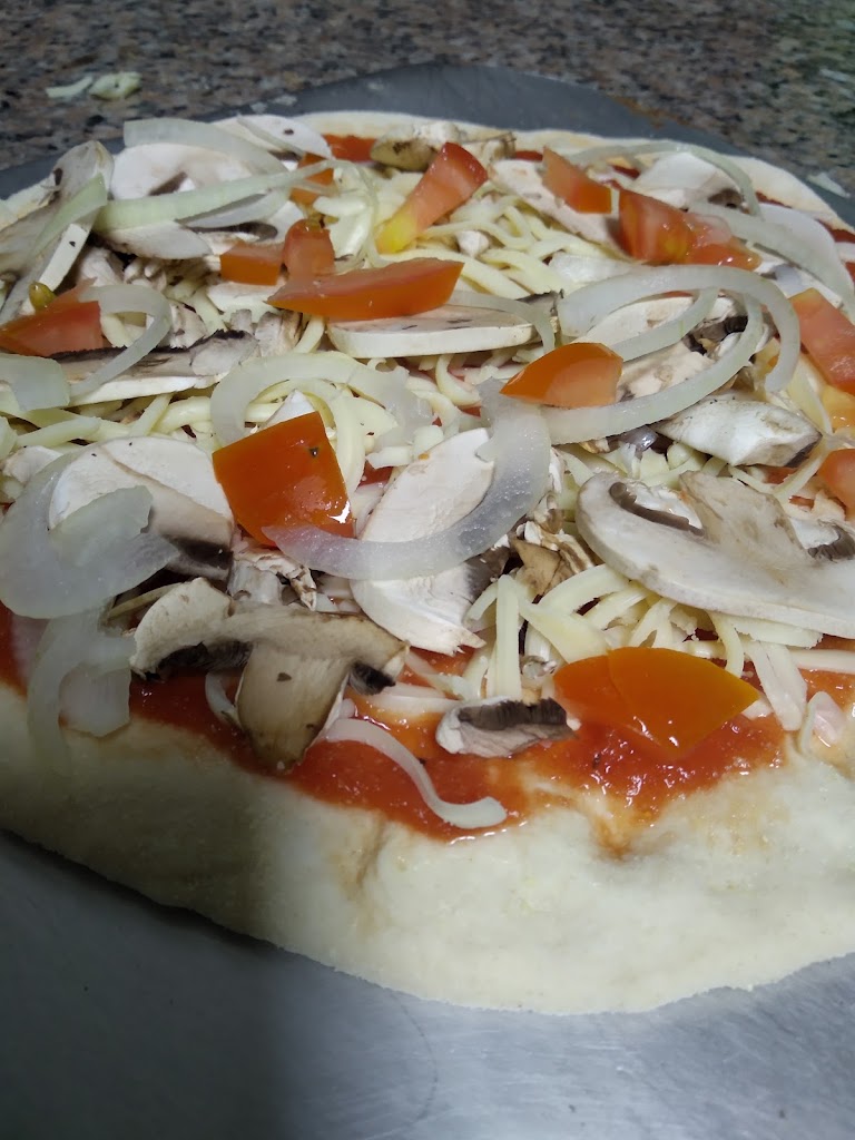 Rock & Roll Pizza — Del propietario