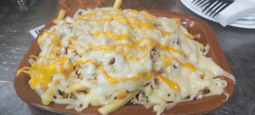 Pizzeria La Forestal — Papas fritas con queso