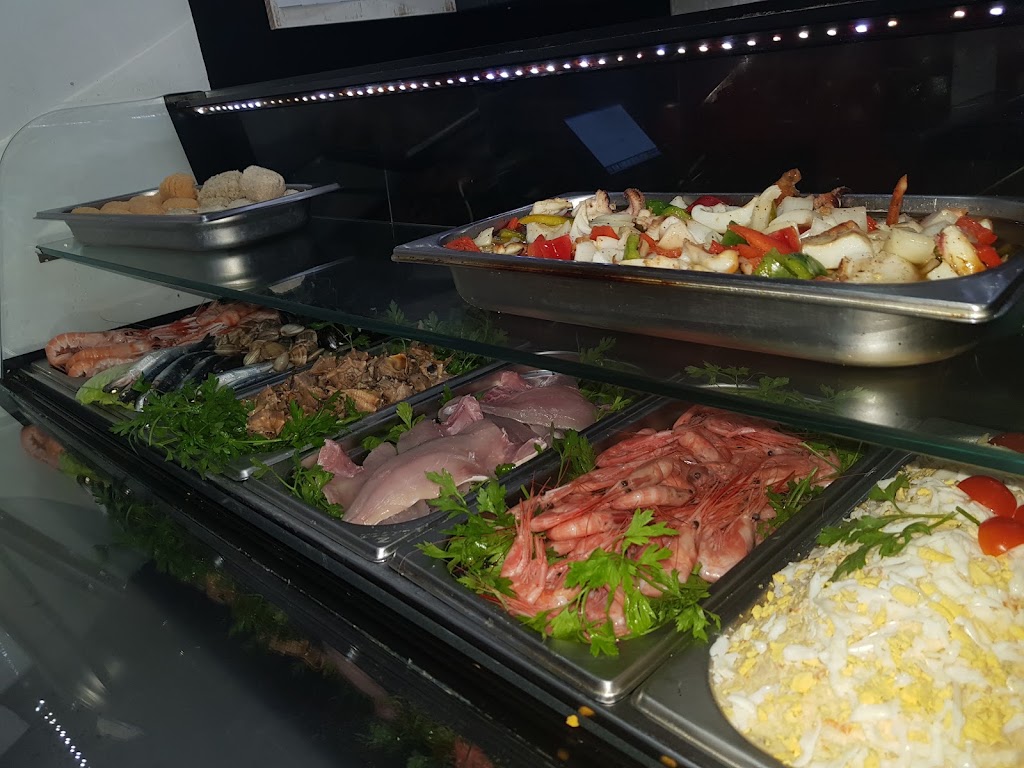 De Tintos — Comida y bebida
