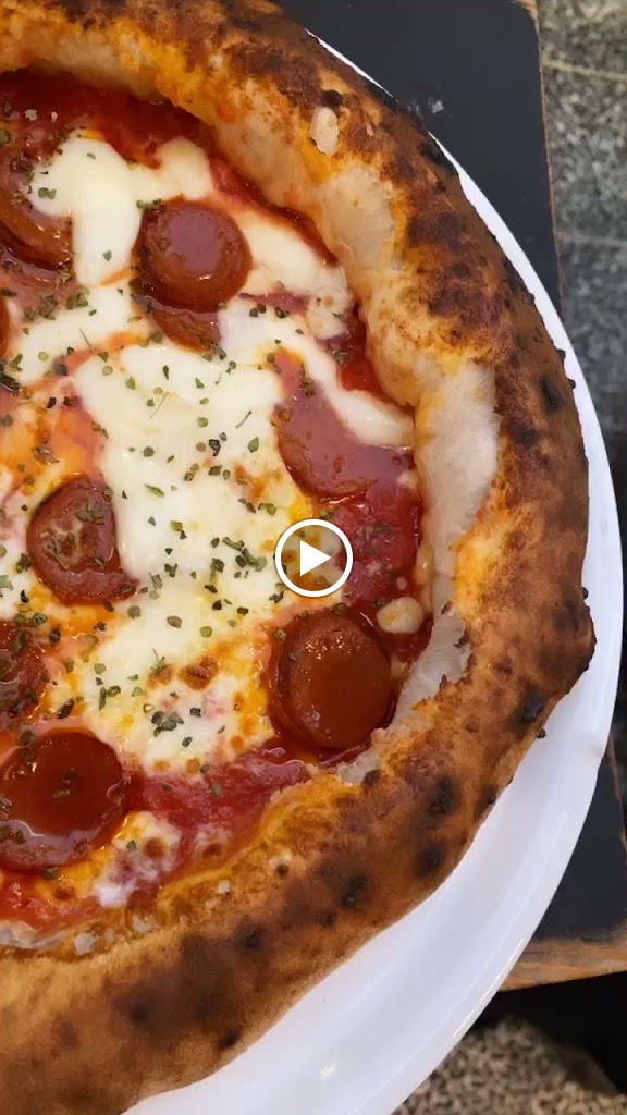 Nuria Pizzeria — Videos