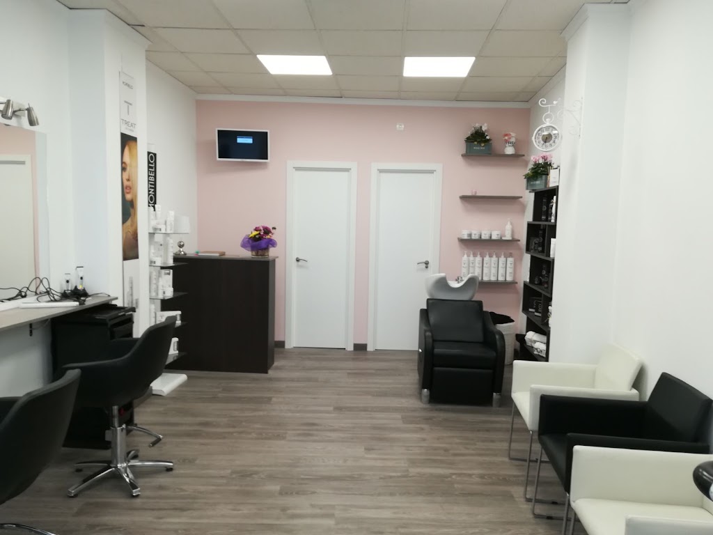 Nely Sandez Peluqueria Mixta — Interior