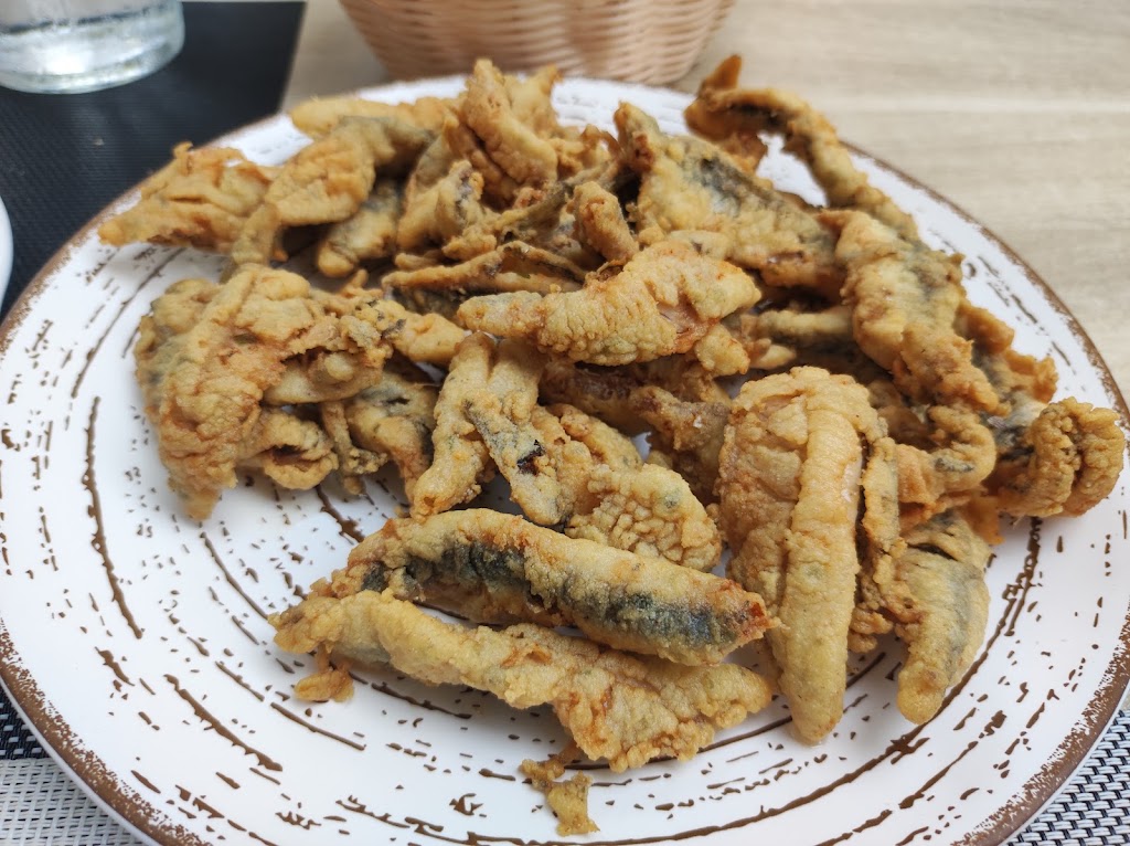 Taberna El Moniato Y Cafeteria Churreria El Moniato — Comida y bebida