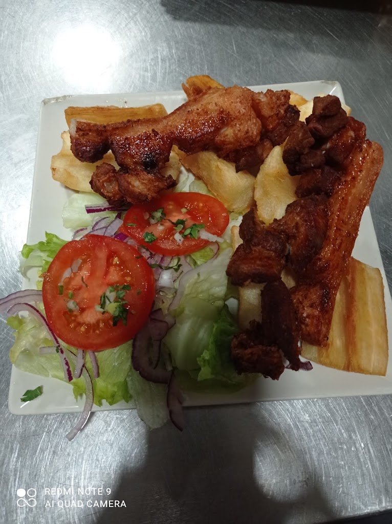 El Capricho De Robert y Paola — Comida y bebida