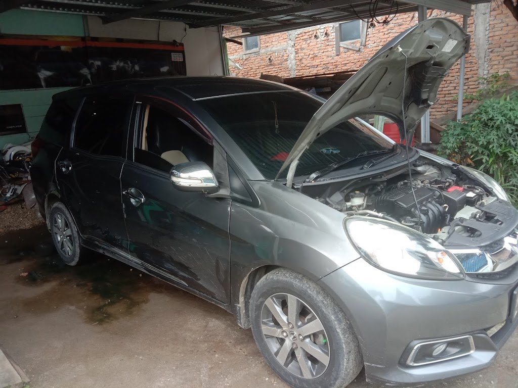 FAJAR UTAMA SERVIS ( Bengkel Mobil Non Solar)
