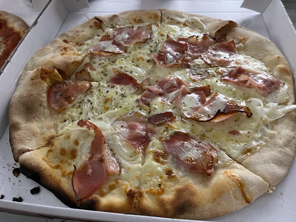 El Rincon de la Pizza — Comida y bebida