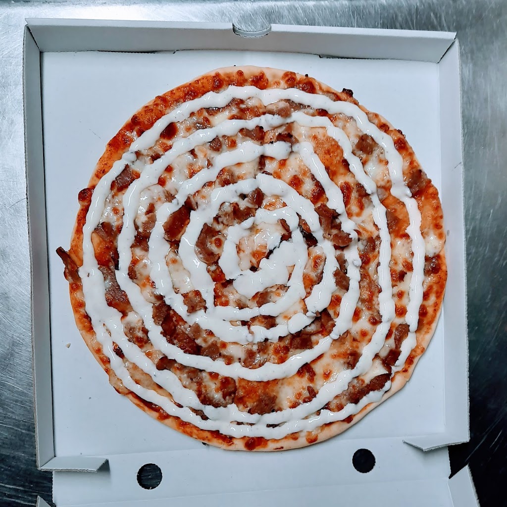 Xativa Kebab y Pizzeria — Comida y bebida