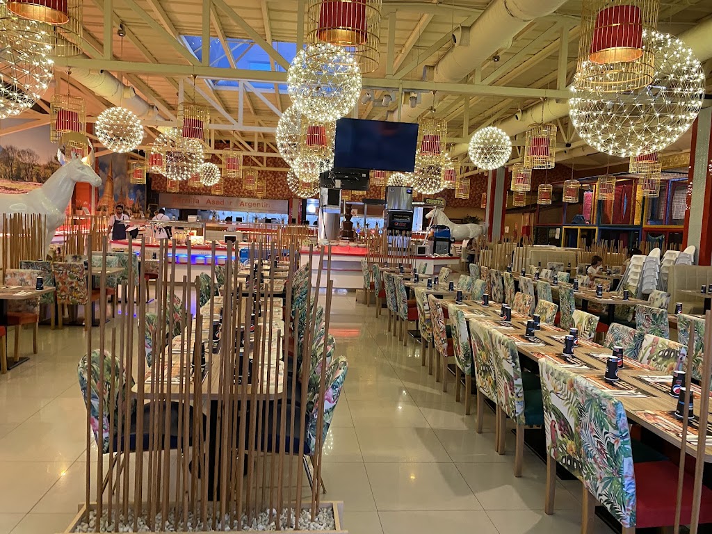 El Reino Asador — Ambiente