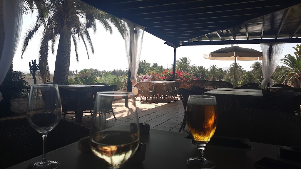 Tres Lunas Restaurante — Comida y bebida