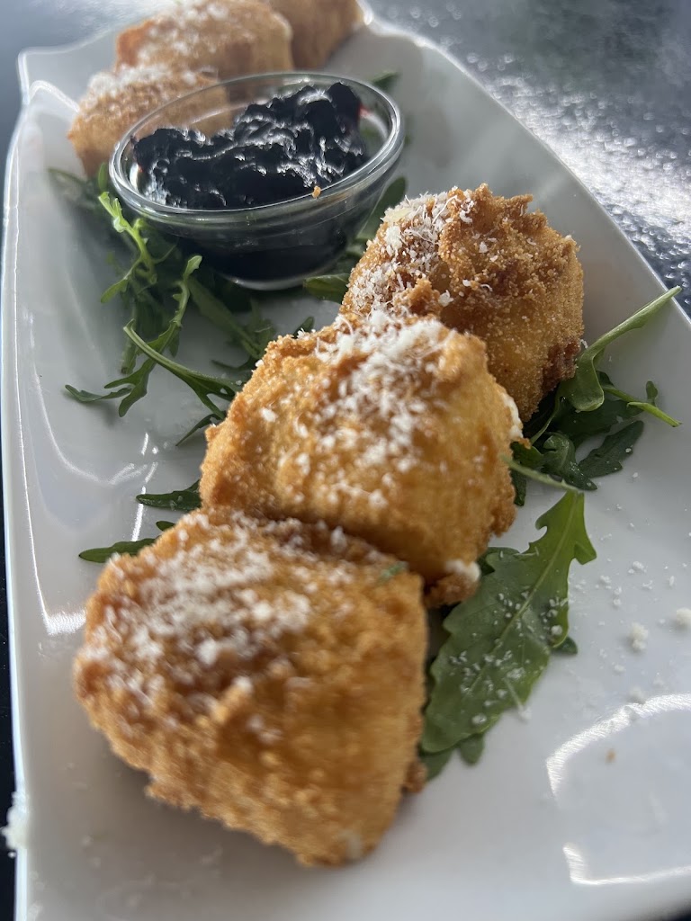 Pizzeria La Sonrisa — Comida y bebida