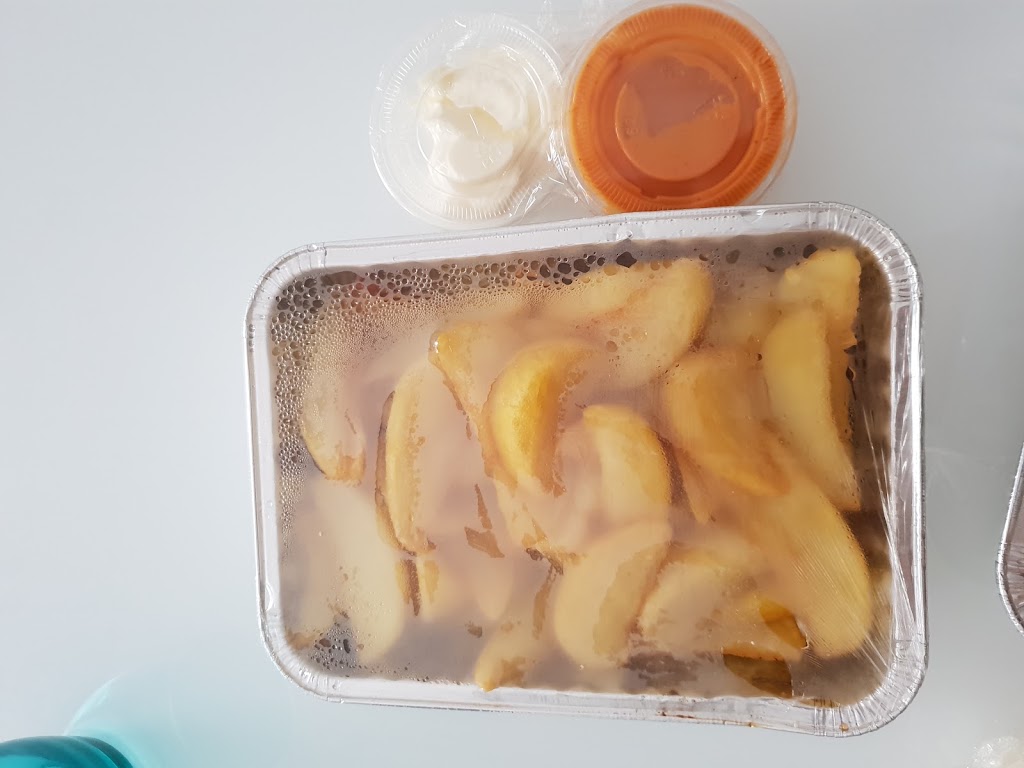 La Bona Teca Rosticeria — Comida y bebida