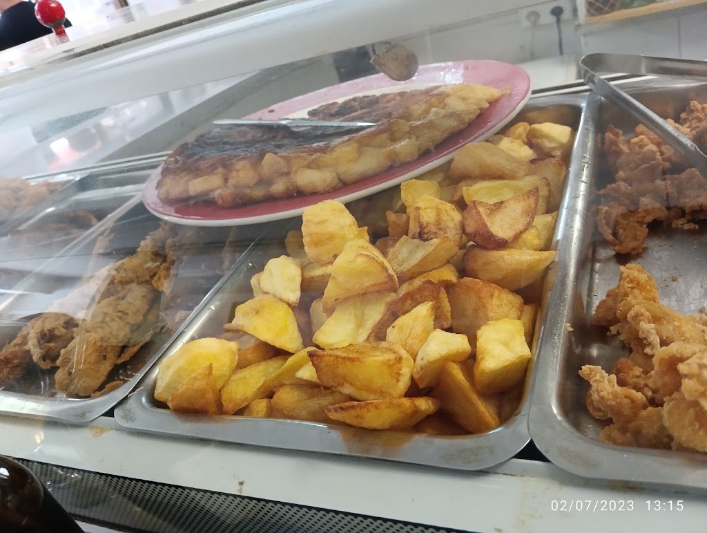Los Claveles — Comida y bebida