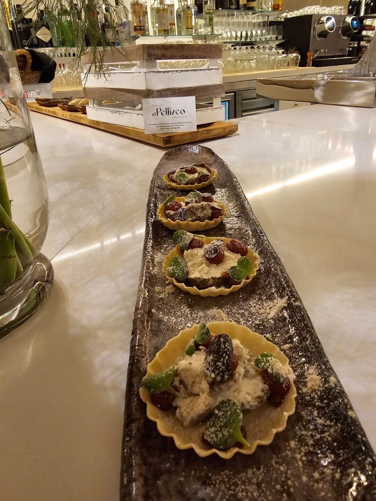 El Pellizco by Rigoberto Almeida — Comida y bebida