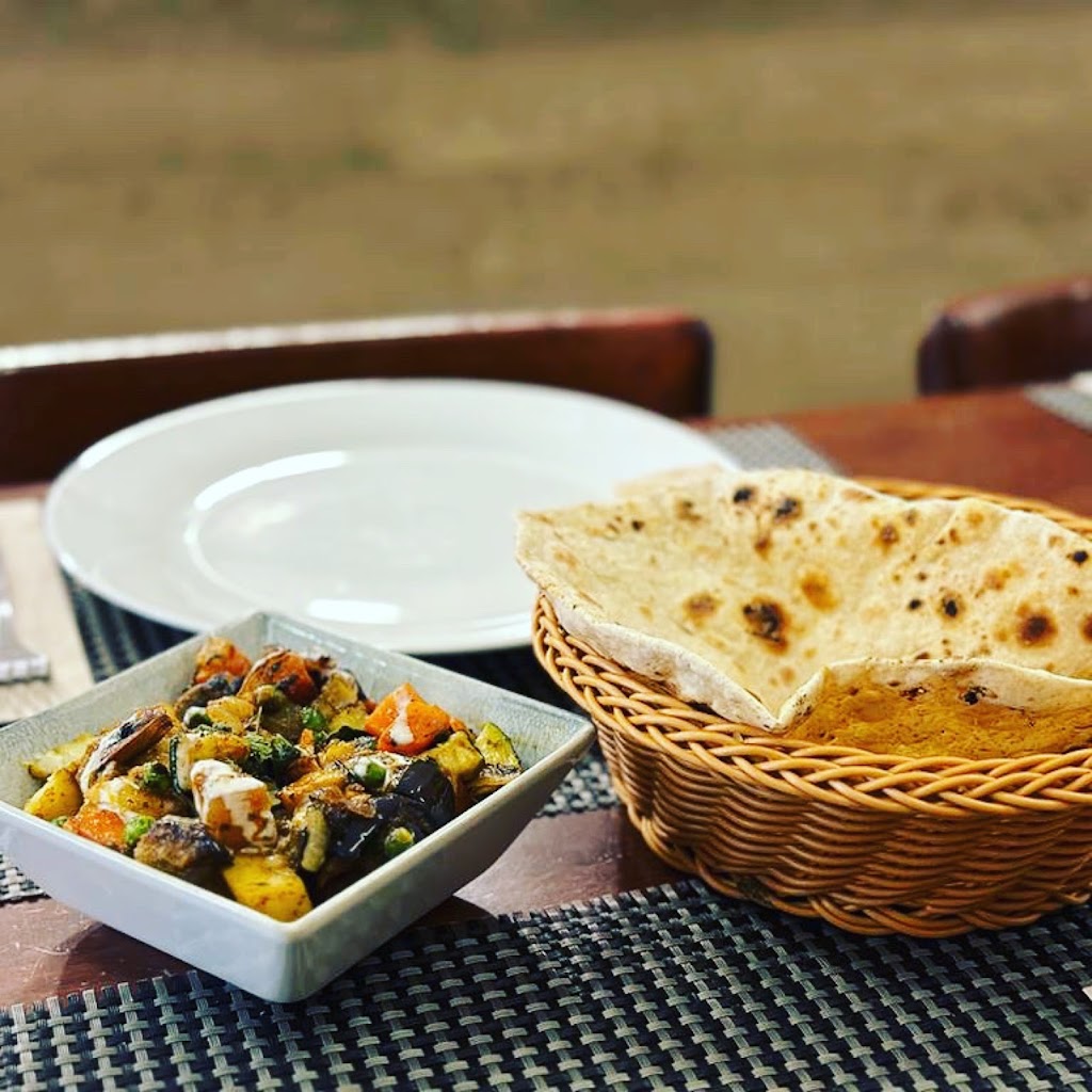 Bistro Restaurant - Menjar de l'India — Comida y bebida