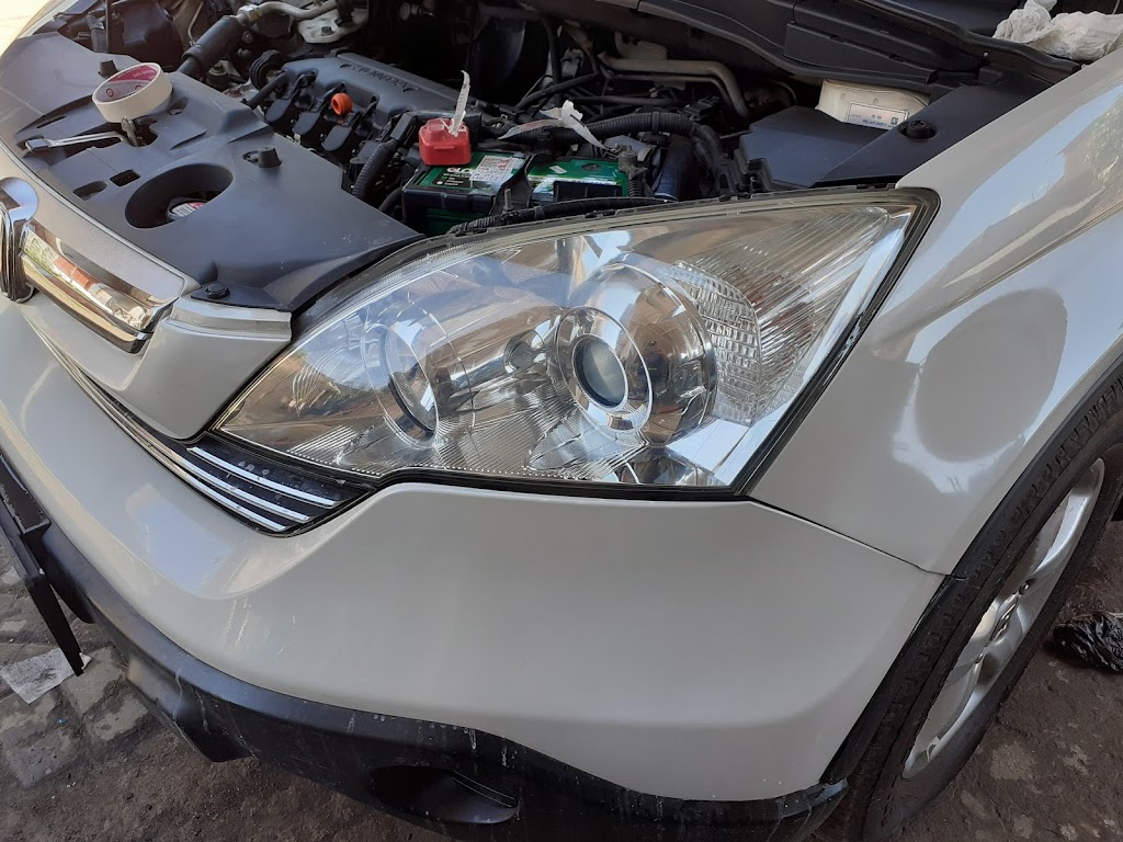 Umbar bengkel cat mobil