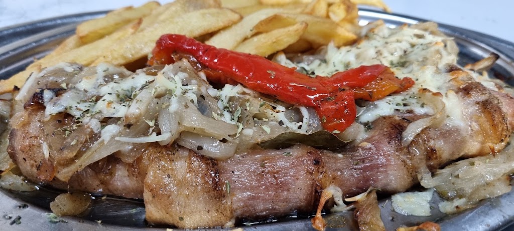 El Buho Tuerto restaurante Parrilla Argentina — Comida y bebida