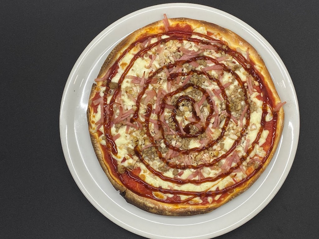 Restaurante Pizzeria Los Poetas — Comida y bebida