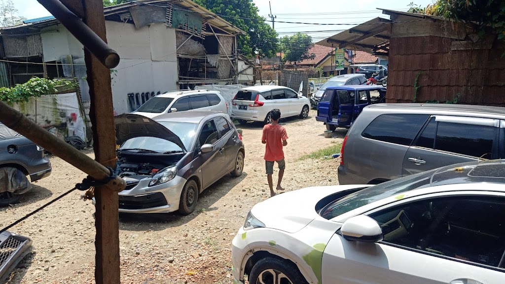 BENGKEL TIRTA MOBIL KARUNDANG