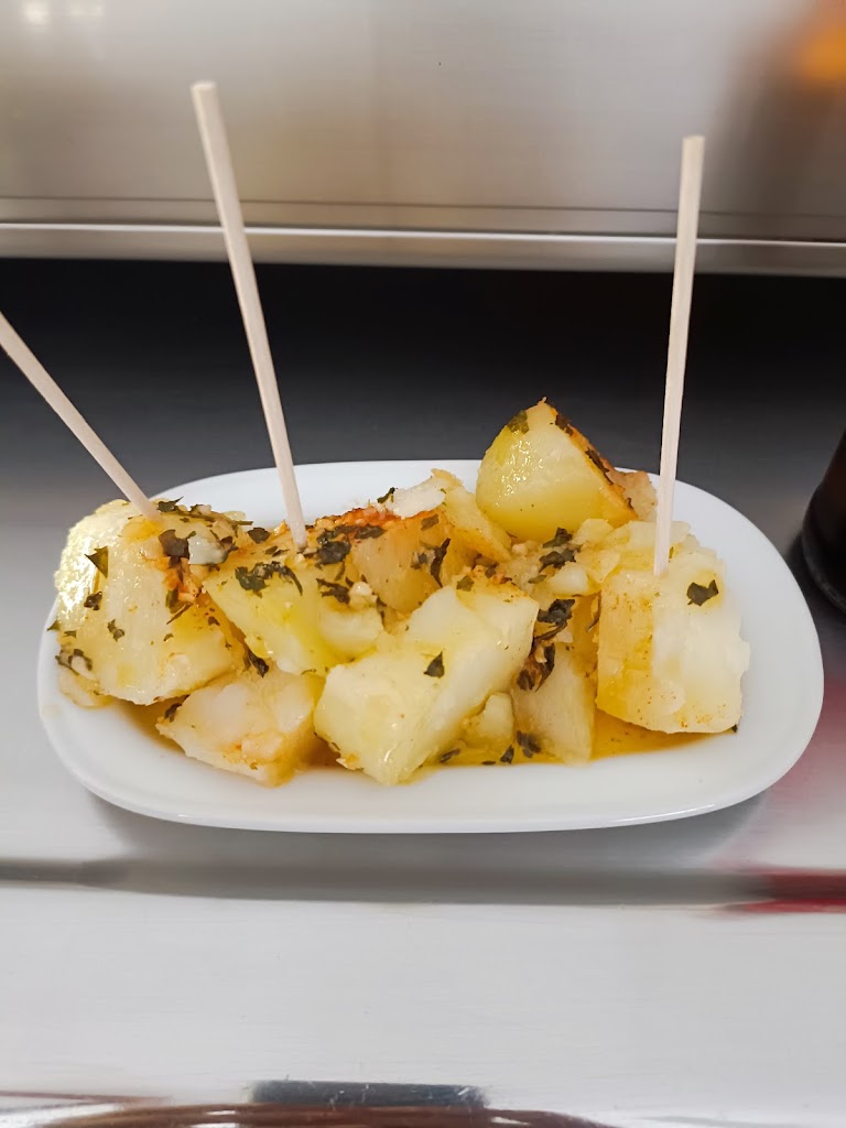 Bar El Precio Justo — Comida y bebida