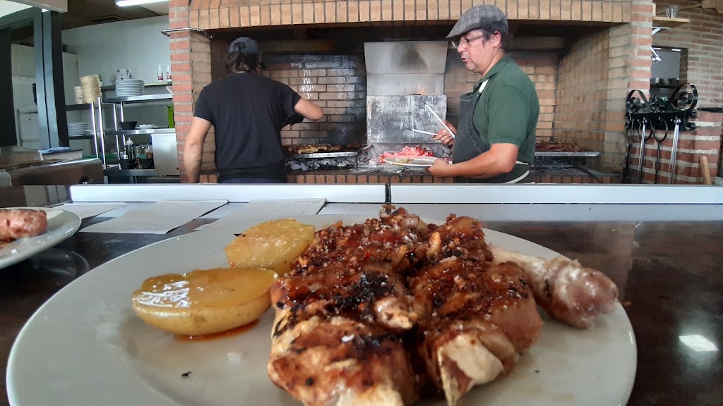 Charrua's Braseria Pizzeria — Comida y bebida