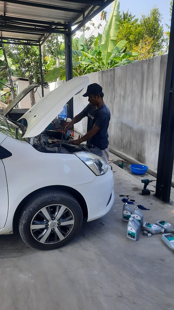 Bengkel Mobil **AZKA MOTOR**