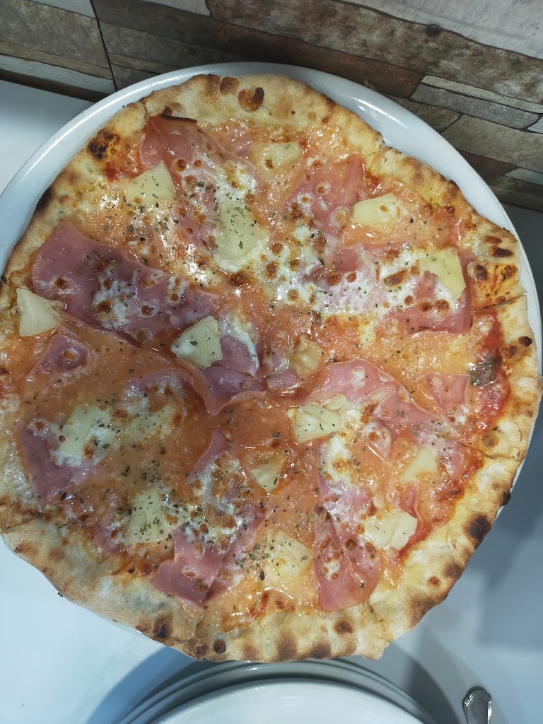 PIZZERIA LA VENECIANA — Comida y bebida