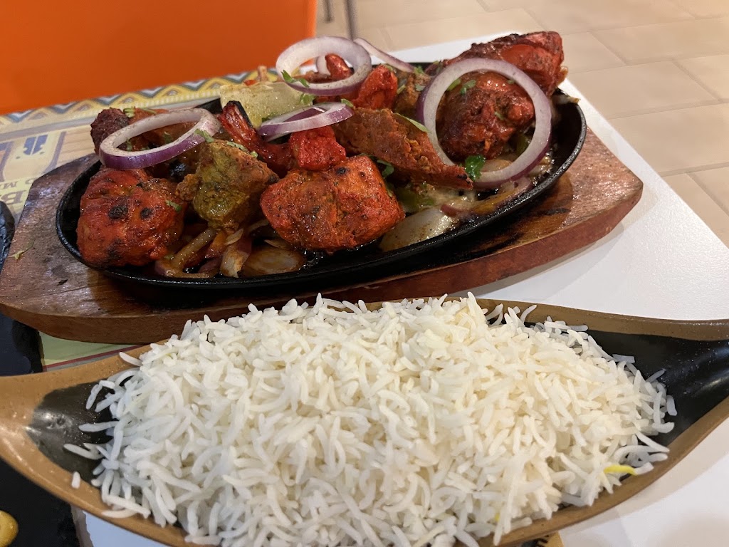 Bombay Tacos Lo Pagan — Pollo tandoori