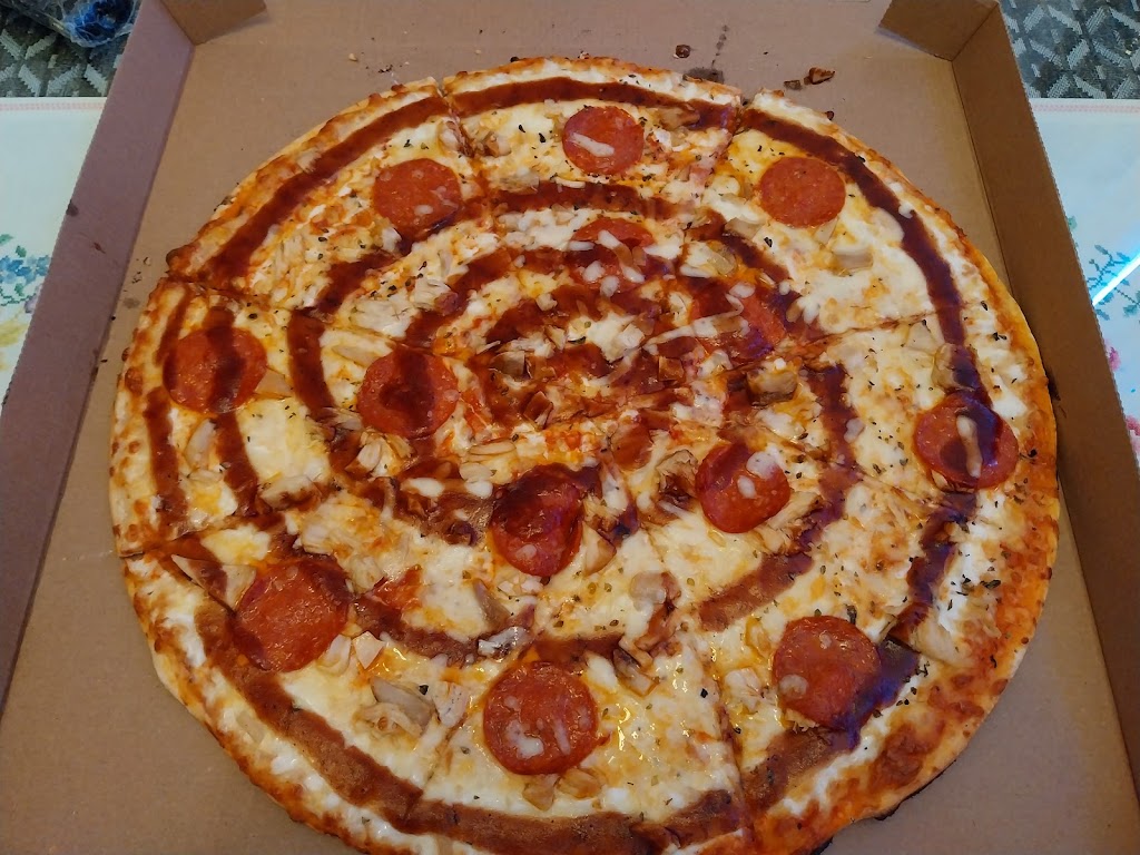 Danis pizza — Comida y bebida