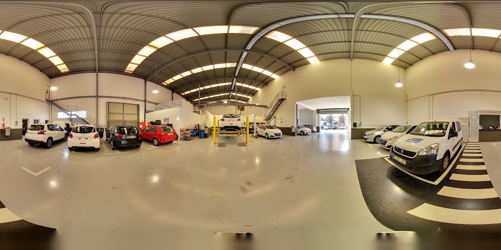 Concesionario Peugeot QUADIS Leonauto — Concesionario de automoviles