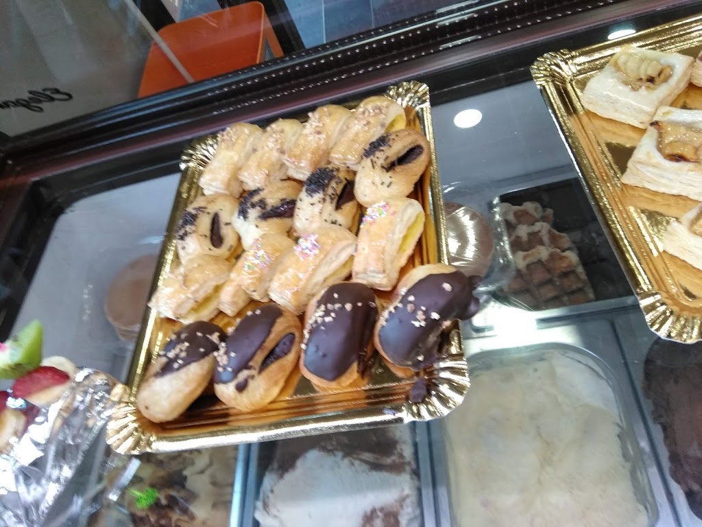 Cafeteria Heladeria El Quijote — Comida y bebida