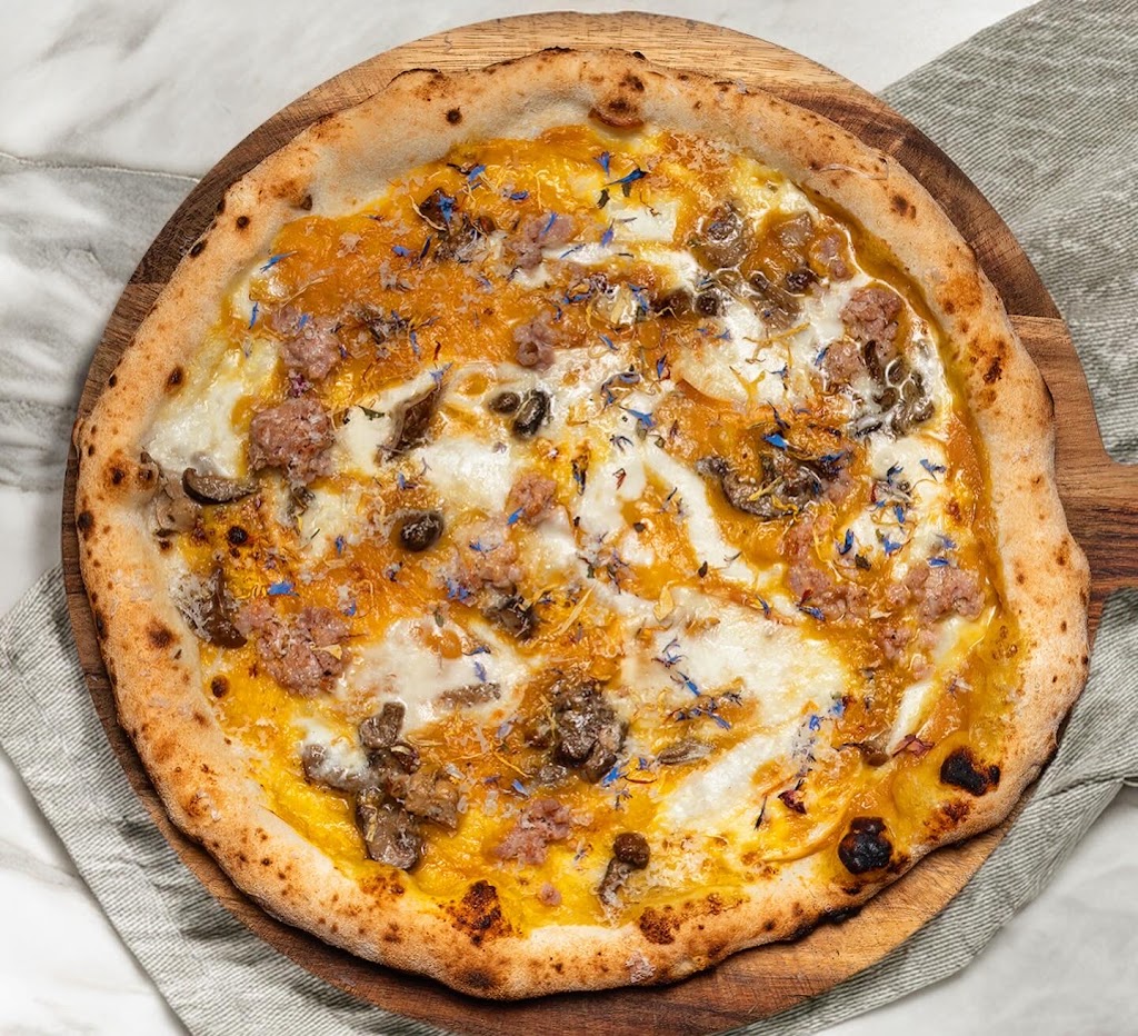 Nuria Pizzeria — Del propietario