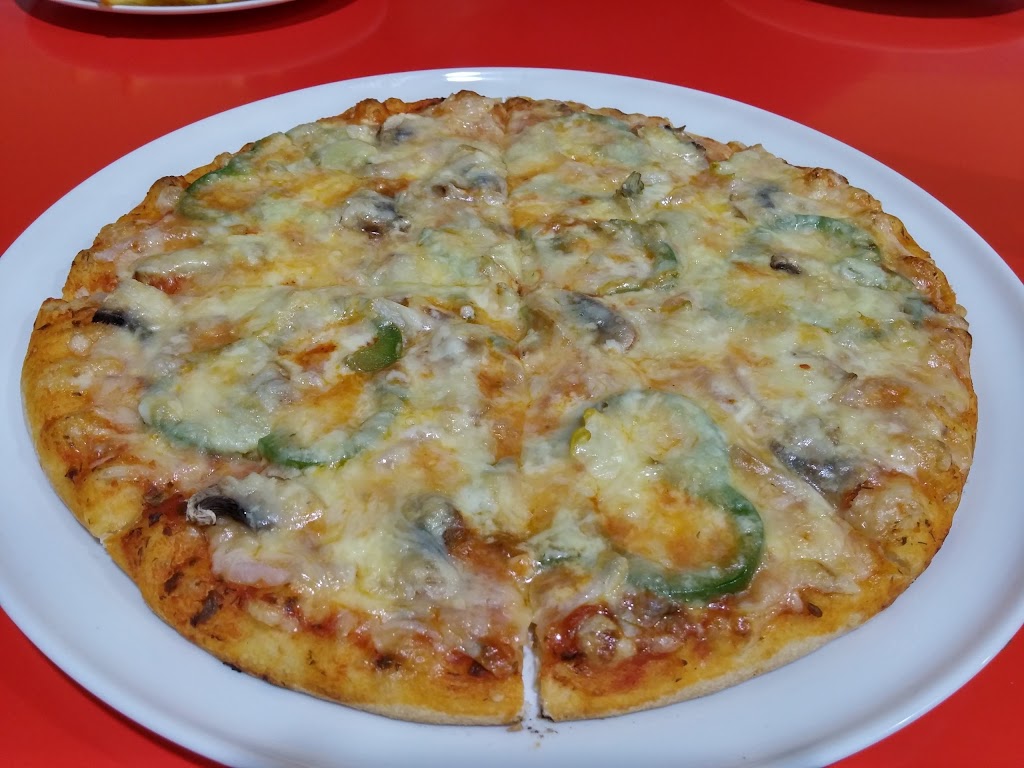 Babar Kebab Pizzeria — Comida y bebida