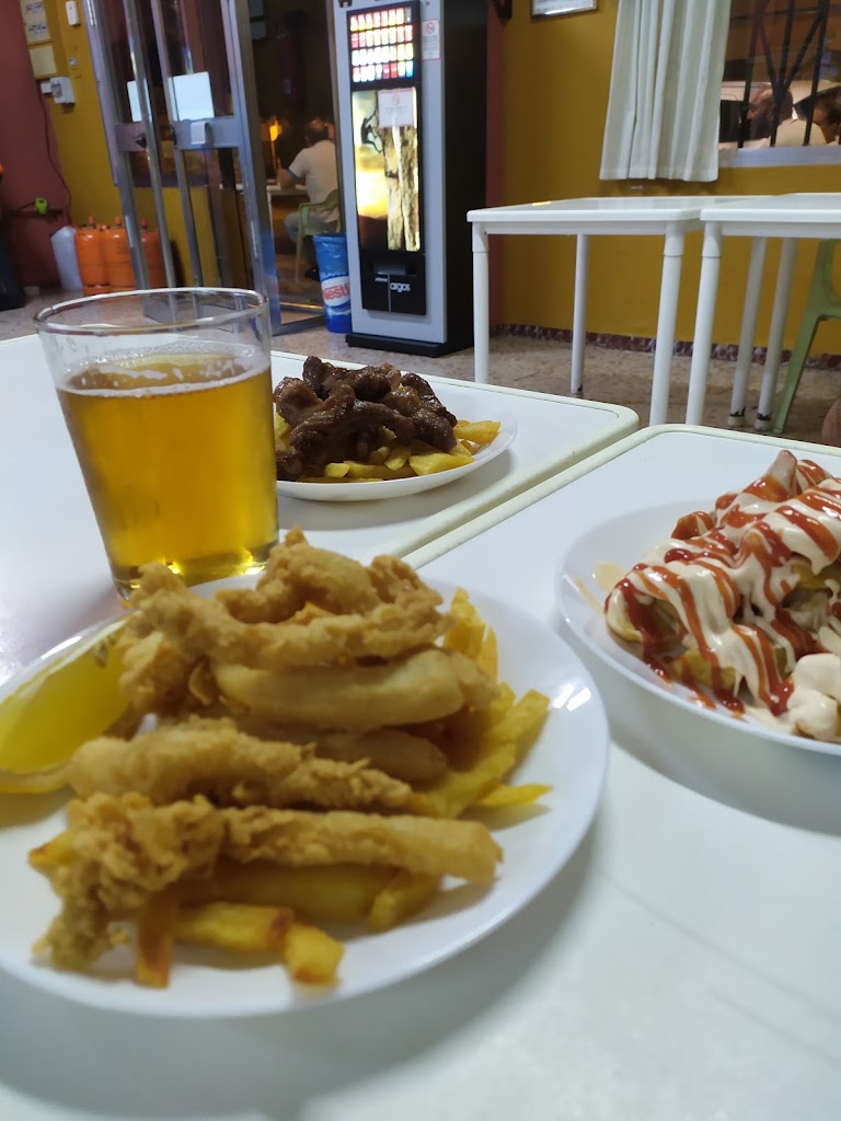 Bar La Charlera. — Comida y bebida