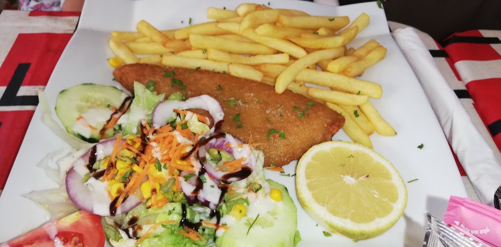 Rara Cafe Bar — Comida y bebida