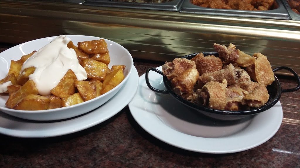 Bar Guacamayo — Comida y bebida