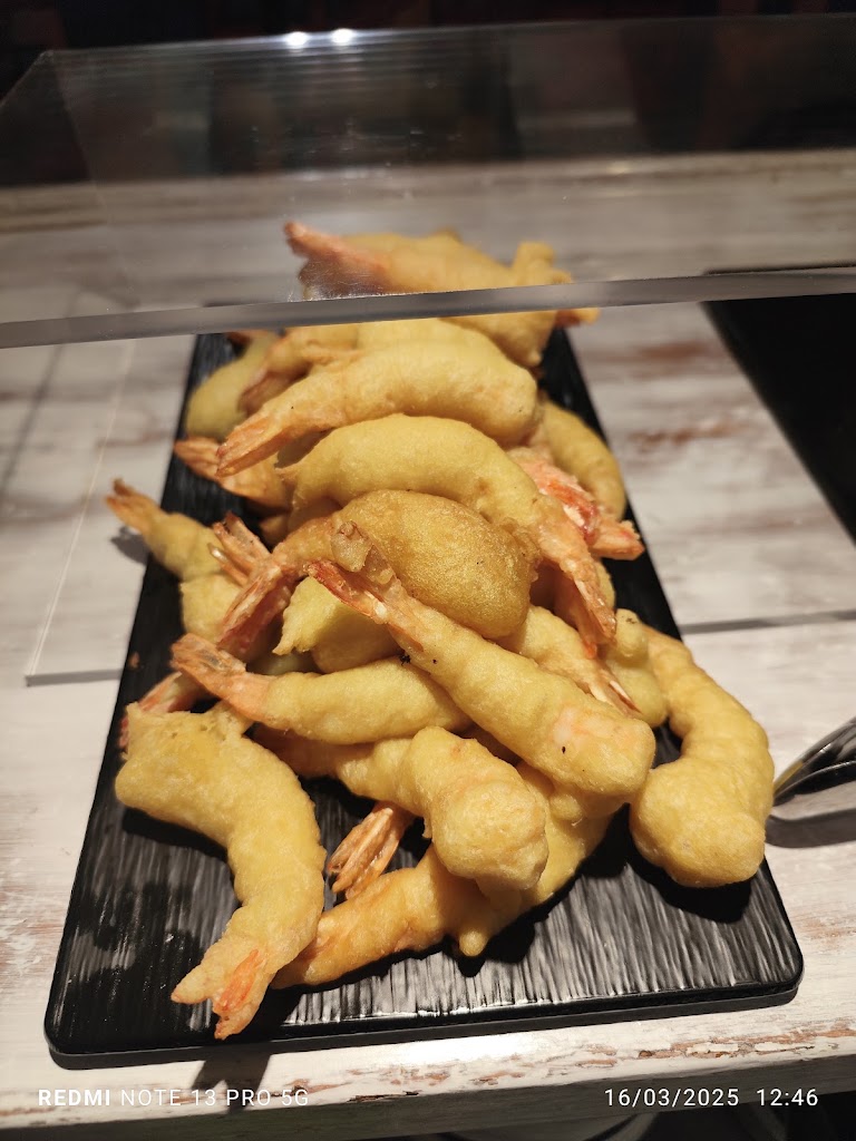 El Redin Gastrobar — Comida y bebida