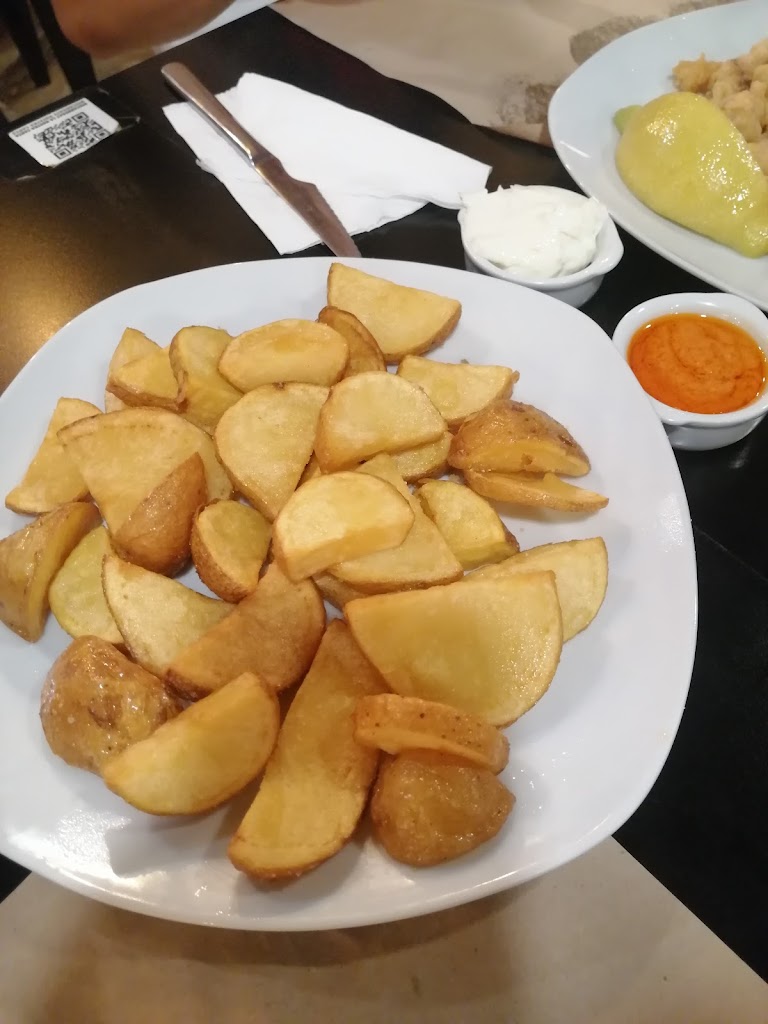 Bar El Punto — Comida y bebida