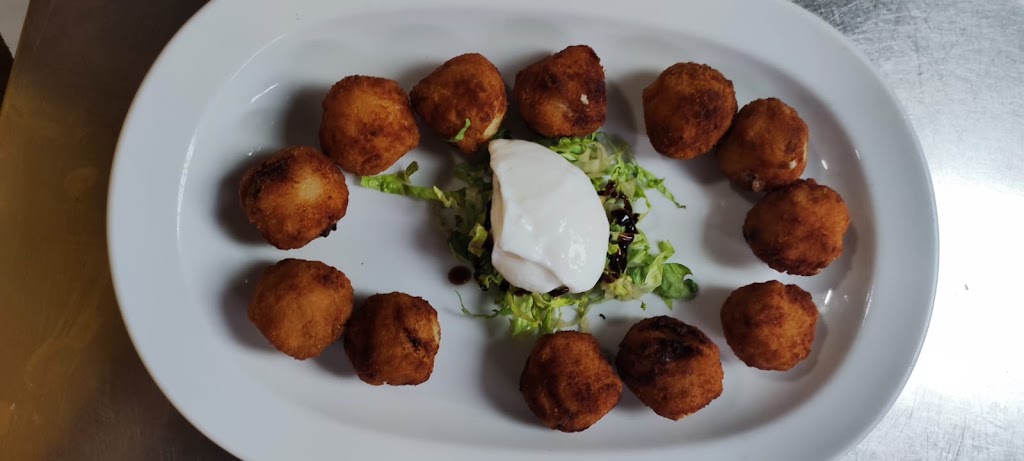 Meson La Serrania de Macias — Comida y bebida