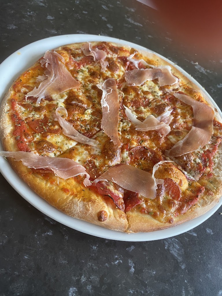 Puerto Pizzeria — Comida y bebida
