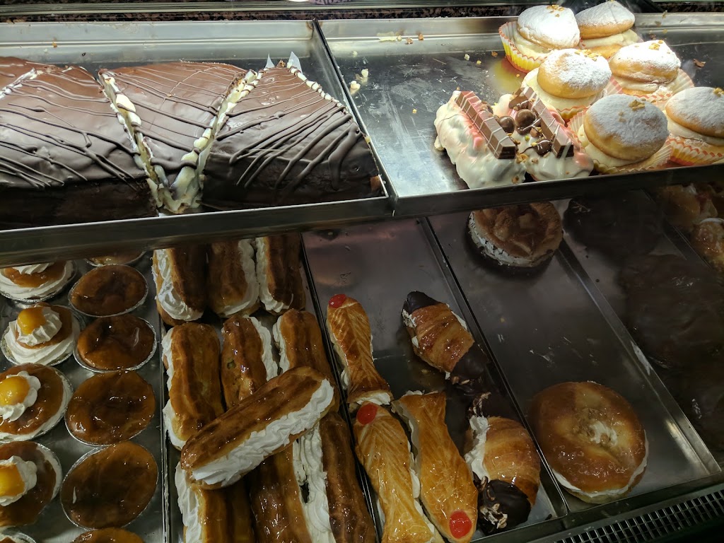 Segovia Pasteleria Confiteria Salon de te — Comida y bebida