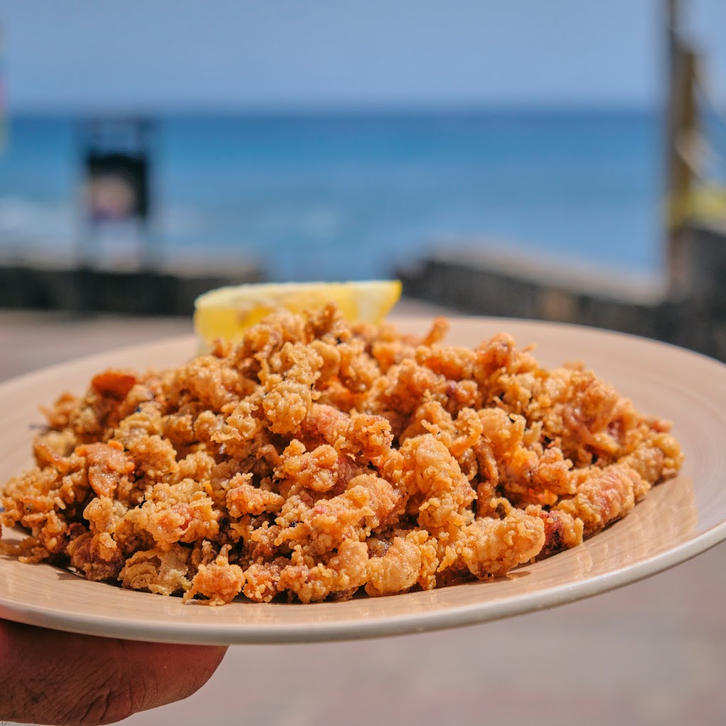 La Charcada El Puertito — Comida y bebida