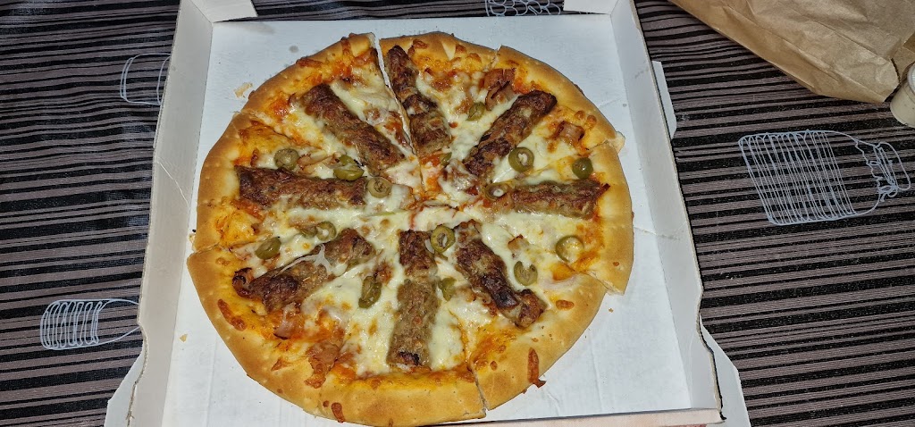The Turkish Kebab & Pizza Carballo — Comida y bebida