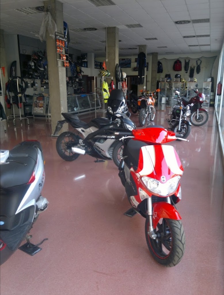 MotoPinic Santomera S.L. — Motocicleta